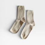 Her Socks in Porcelain