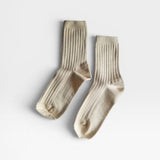 Her Socks in Porcelain