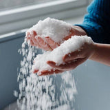 hands holding the flakey norweigan sea salt