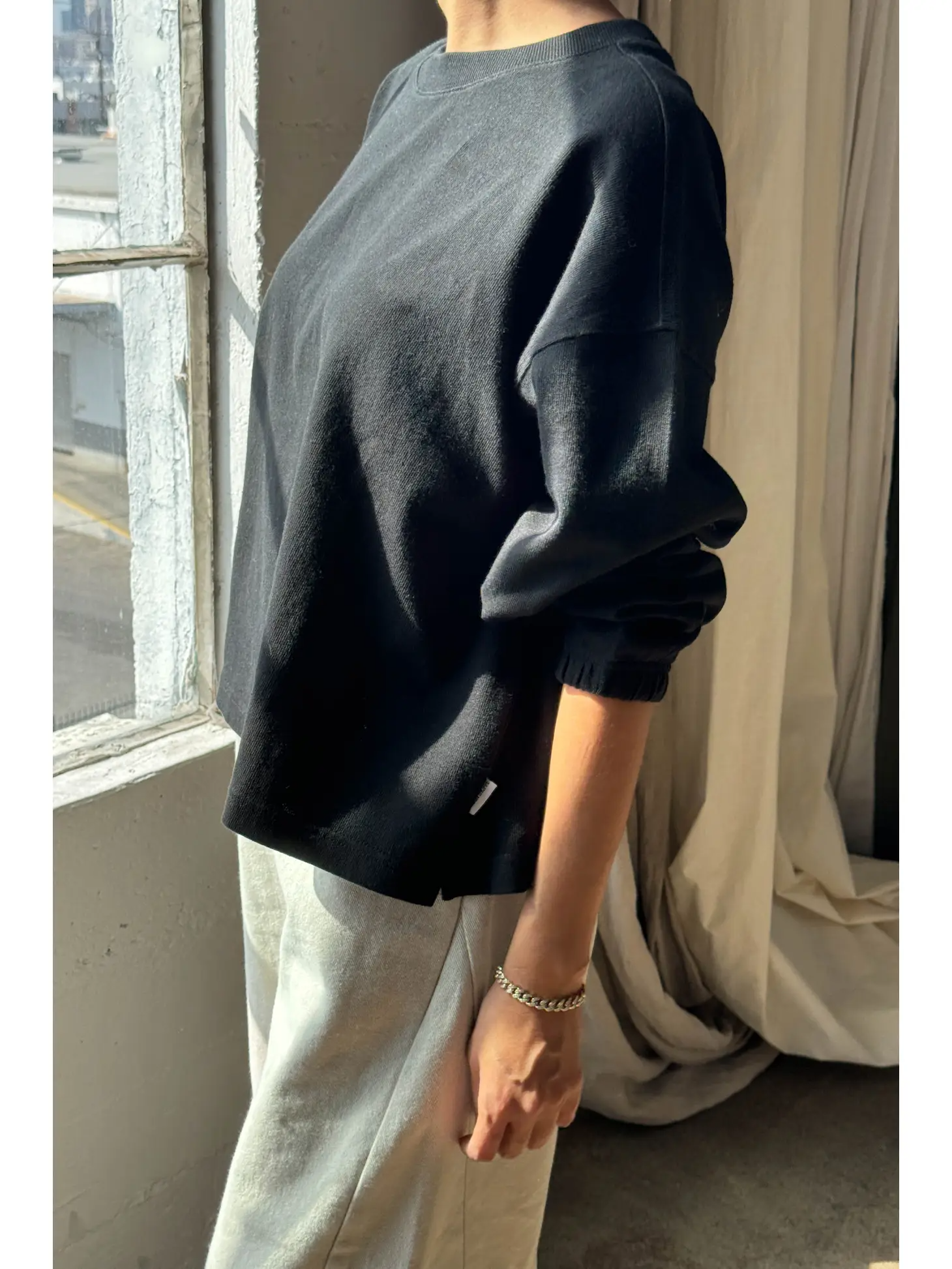 Side of Naturelle Tee - Black