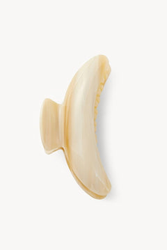 Pearlescent large claw clip on a white background