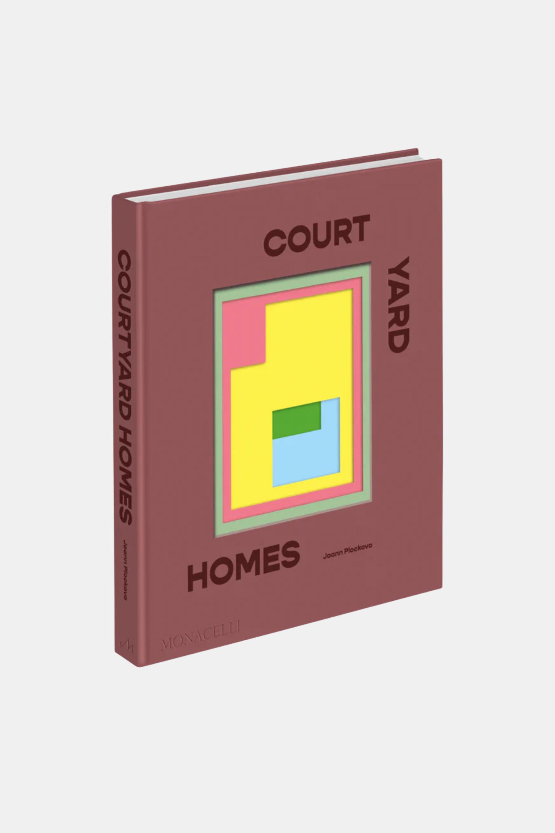 Book titled 'Court Yard Homes' with a colorful cover on a white background