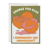Card with cartoon oranges and humorous text on a white background