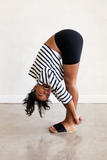 Model doing yogi with Mullen Slide - Black on