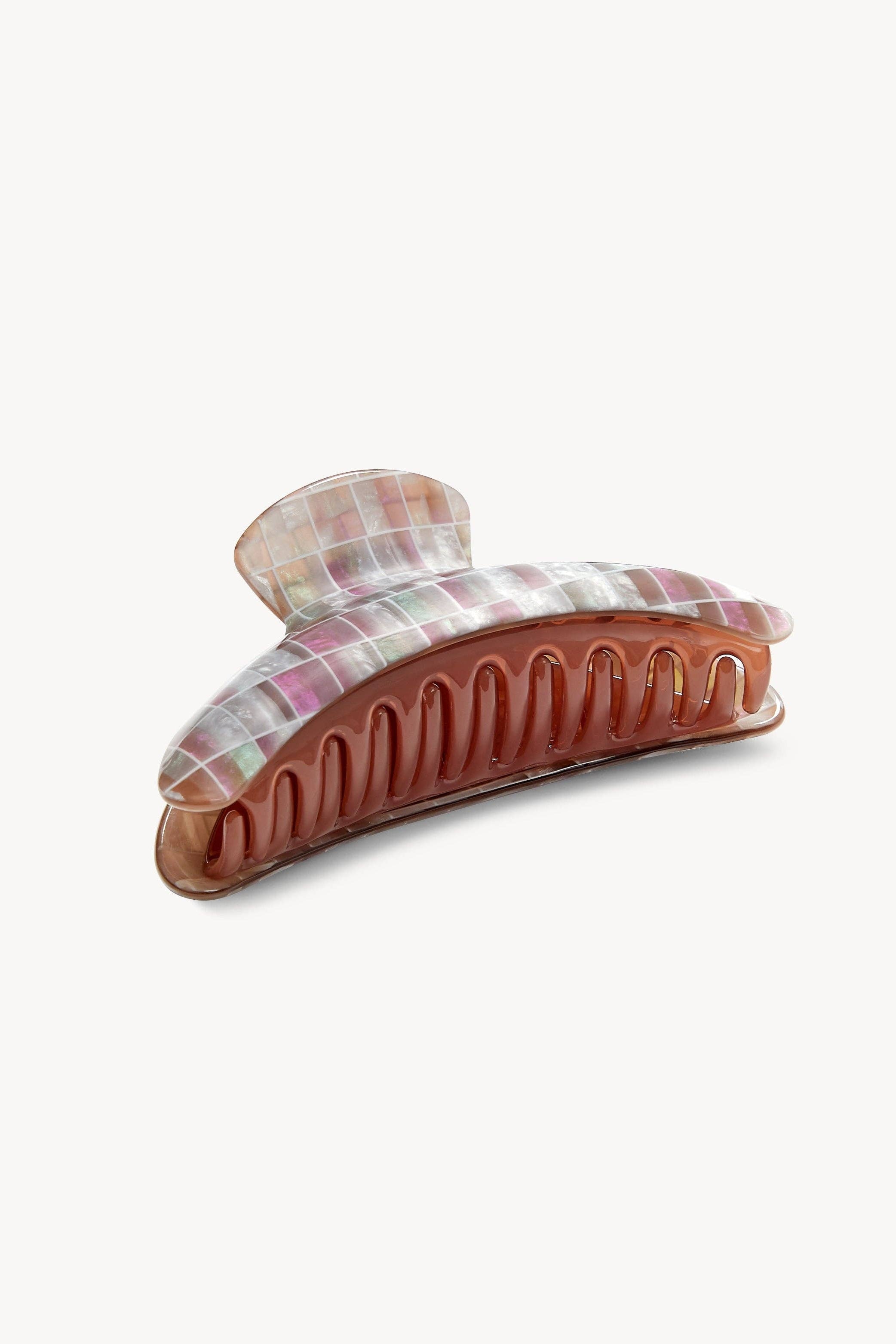 Plaid-patterned hair clip on a white background