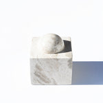 stone box with ball lid, white background