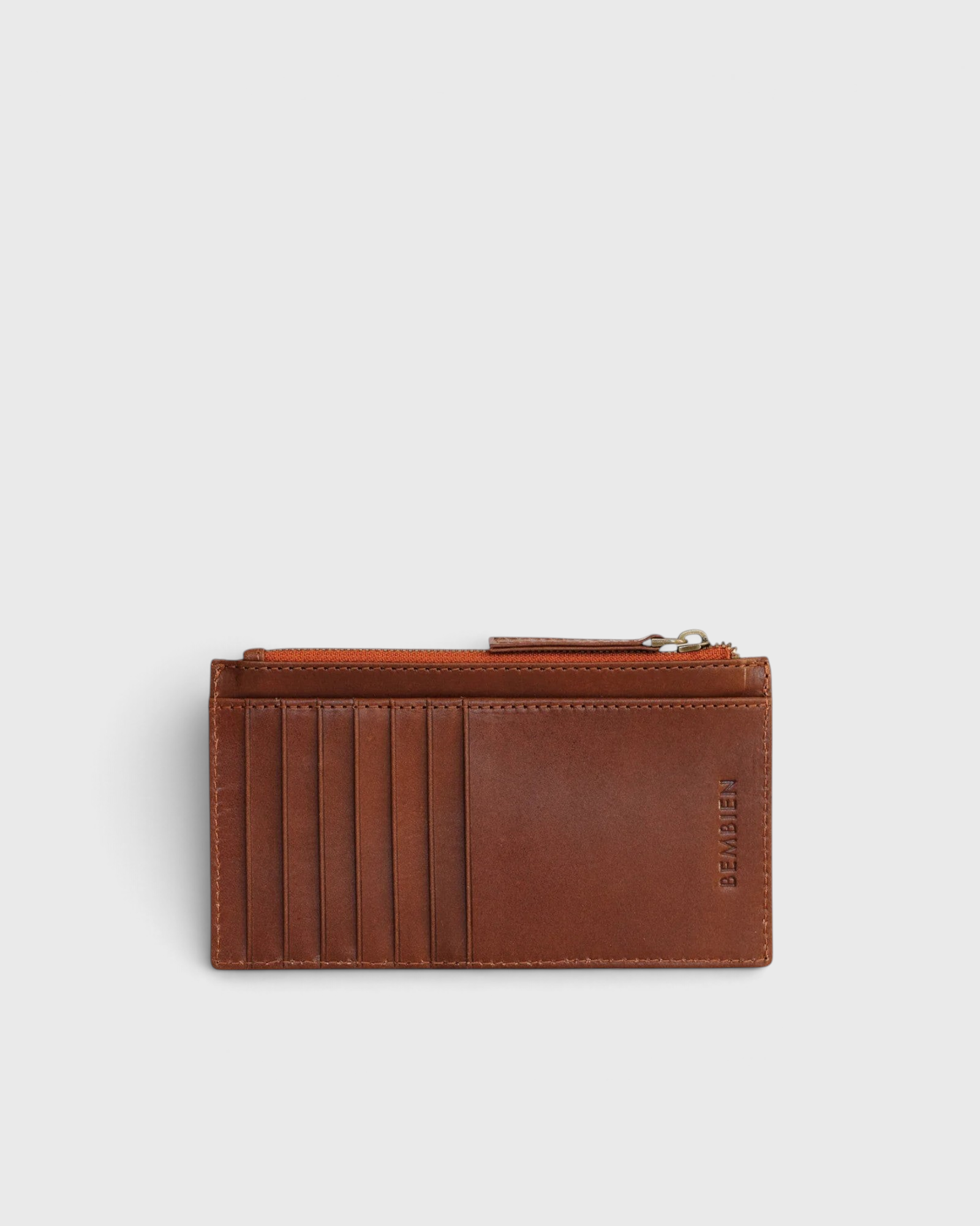 JONES + CO Odin card case in sienna brown leather with seven slots and a zip pouch for essentials