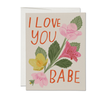 Greeting card with floral design and 'I love you babe' text on a beige background