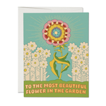 Greeting card with a stylized flower design and text on a white background