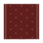 Burgundy scarf with white diamond pattern on a white background