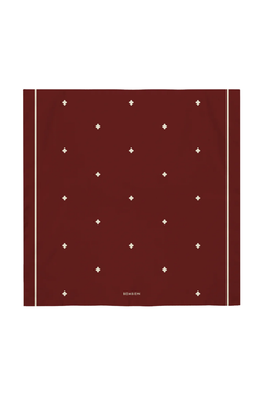 Burgundy scarf with white diamond pattern on a white background