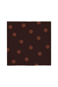 Brown fabric square with lighter brown polka dots on a white background