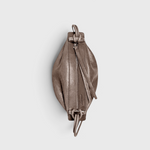 JONES + CO Bon-Bon Cords bag in shiny taupe Italian leather with pleated ends and a metal clasp closure.