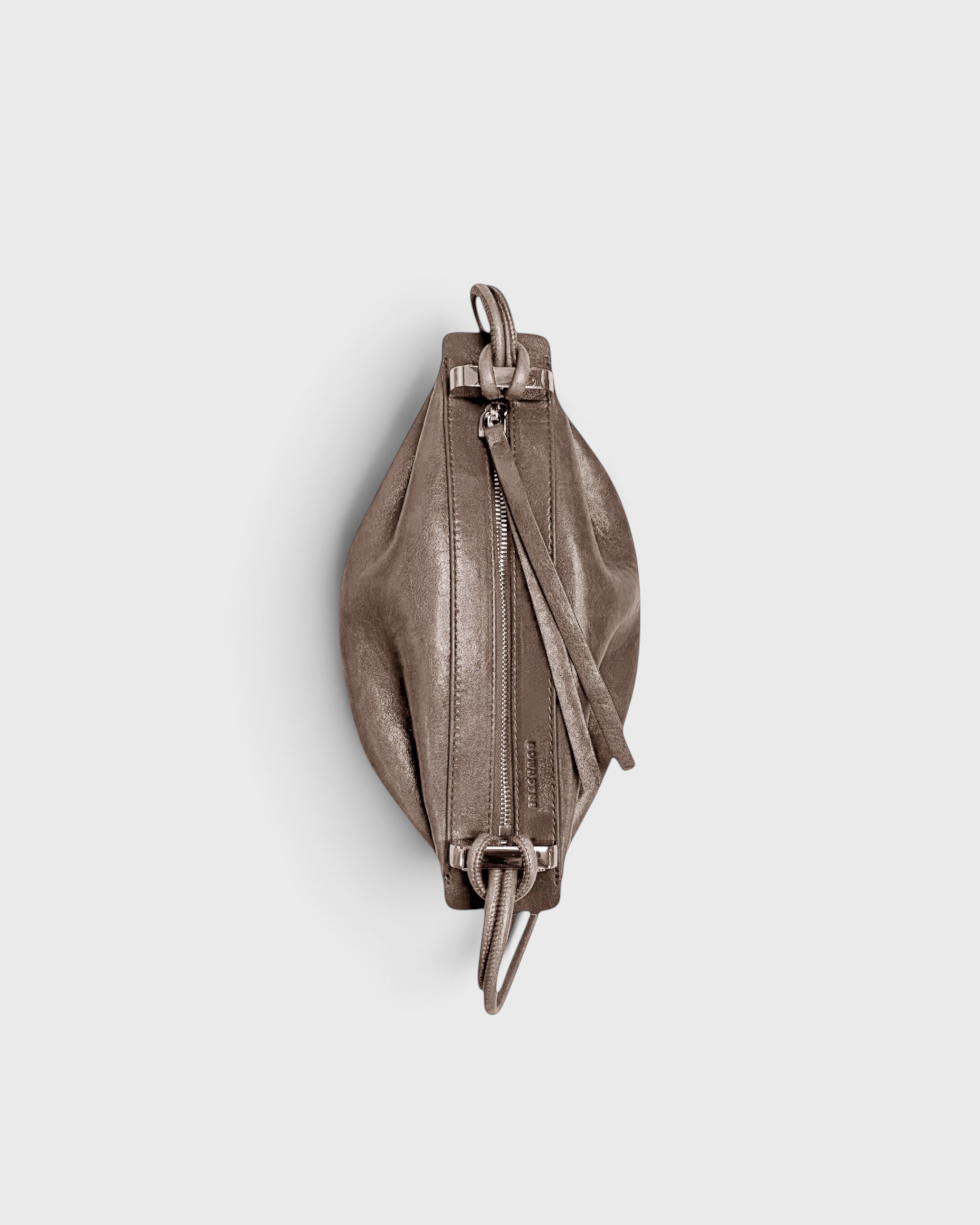 JONES + CO Bon-Bon Cords bag in shiny taupe Italian leather with pleated ends and a metal clasp closure.