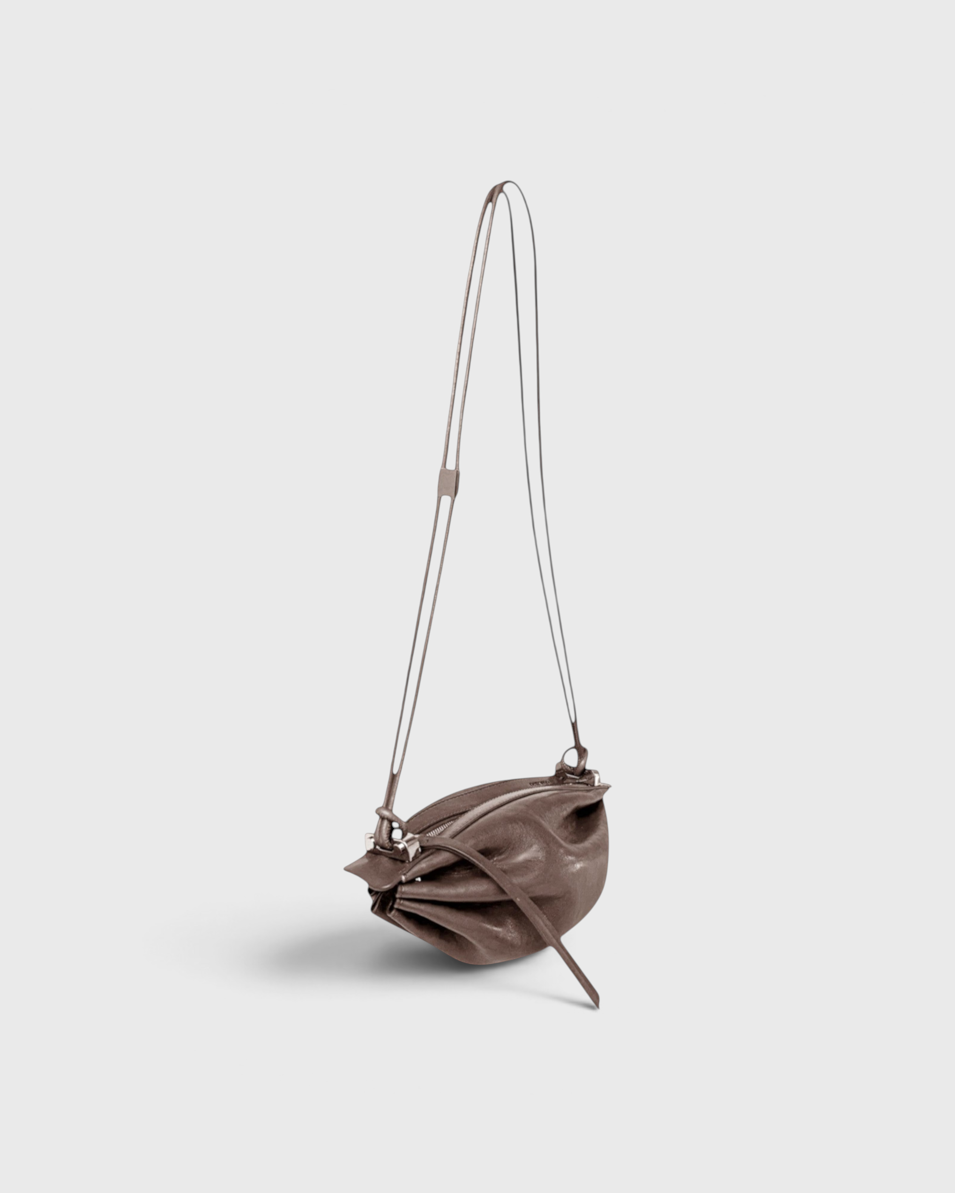 JONES + CO Bon-Bon Cords bag in shiny taupe Italian leather with a pleated design and double leather cord strap.