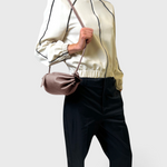 JONES + CO Bon-Bon Cords bag in shiny taupe Italian leather with a pleated design and double cord shoulder strap.