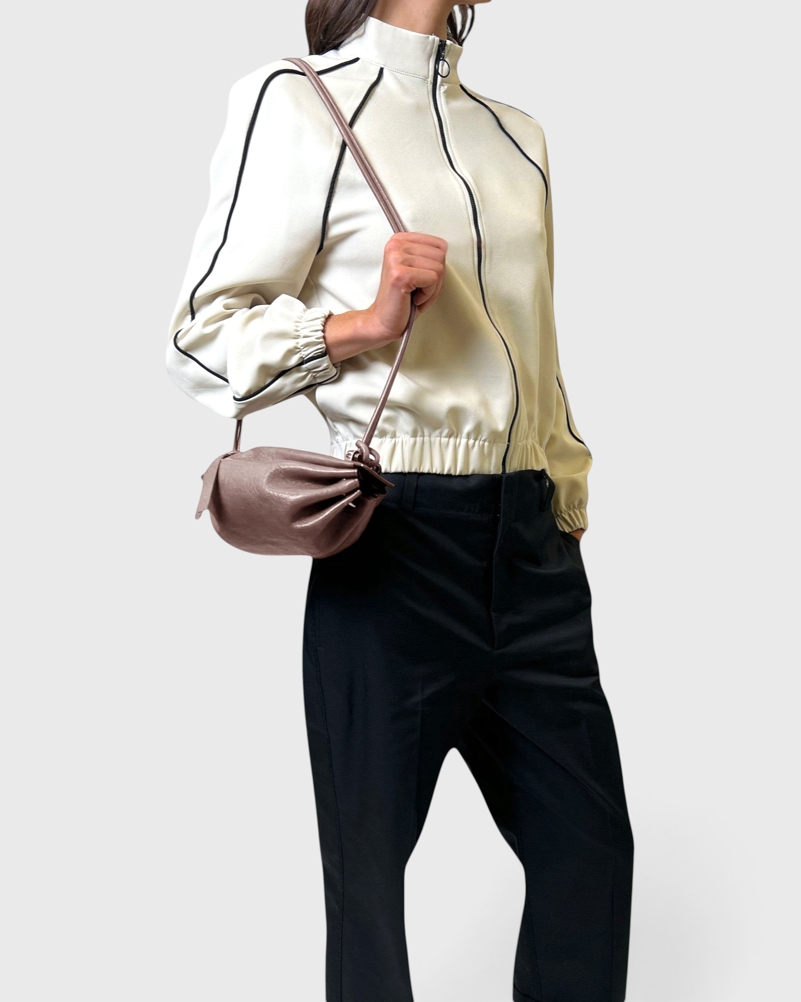 JONES + CO Bon-Bon Cords bag in shiny taupe Italian leather with a pleated design and double cord shoulder strap.