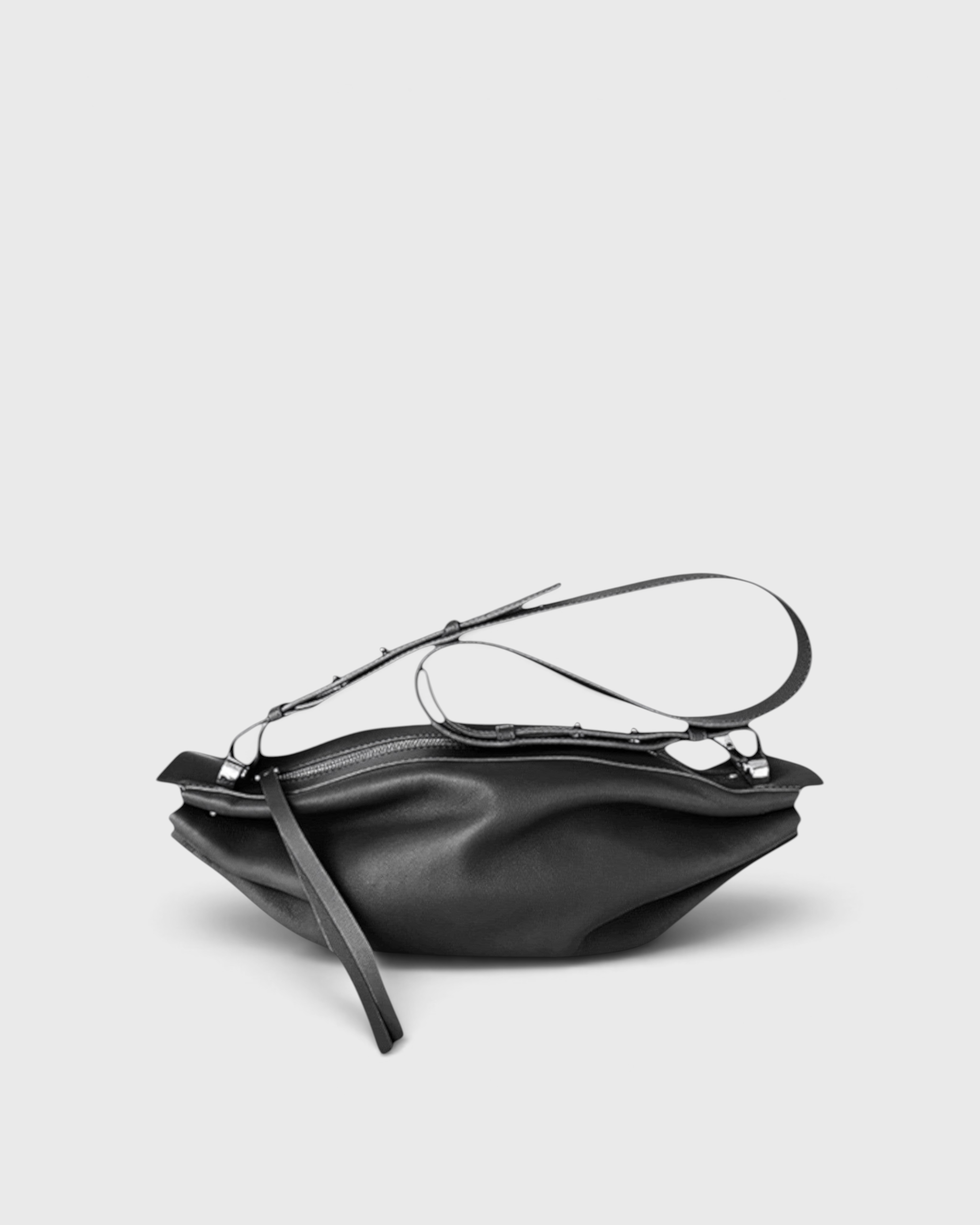 JONES + CO Bon-Bon M black leather crossbody bag with pleated ends and adjustable strap
