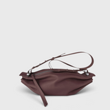 JONES + CO Bon-Bon M wine leather crossbody bag with pleated ends and silver metal clasp detail