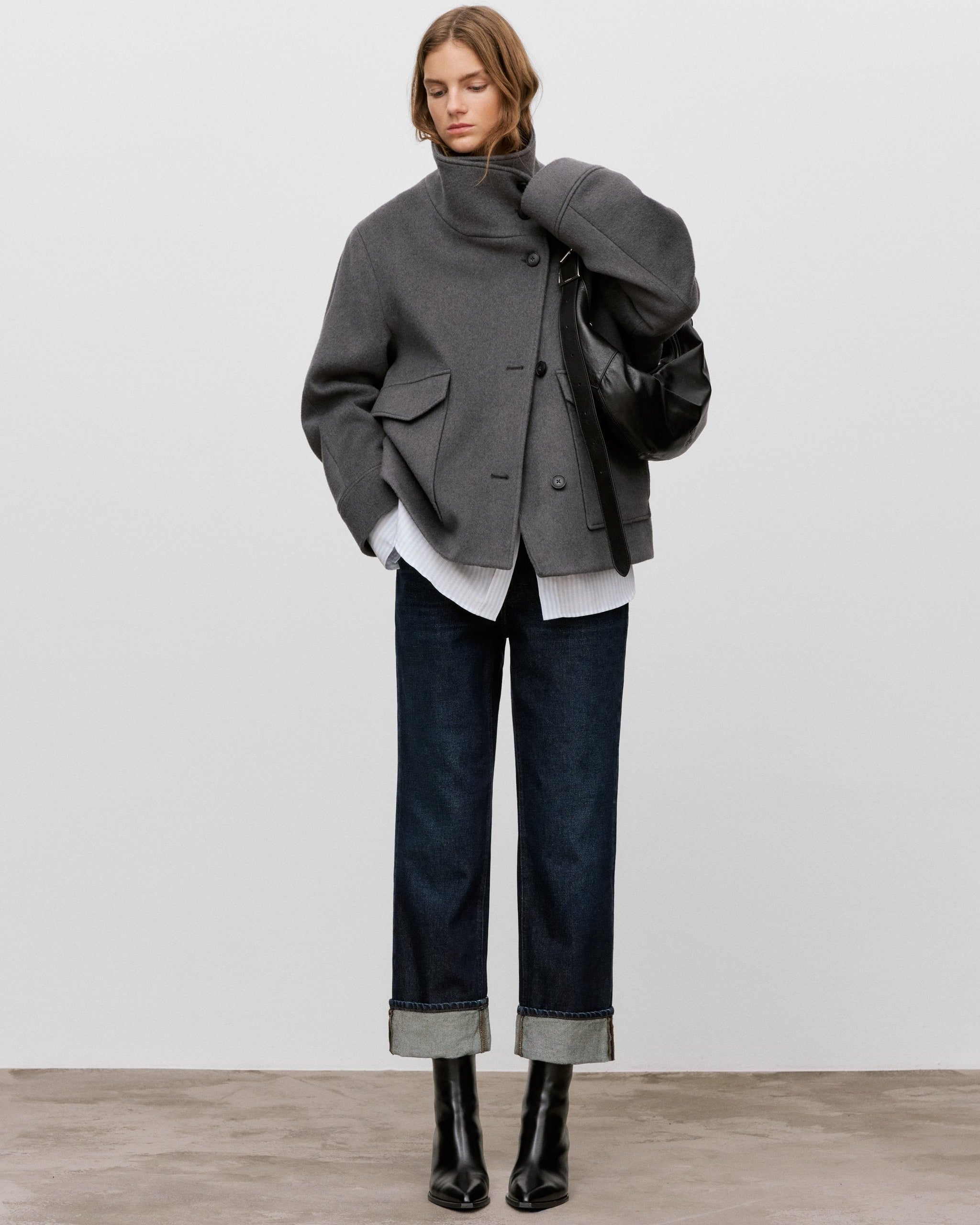 CLOSED Milo Jeans - Dark Blue, styled full-length look showing the cuffed hems and straight cropped leg.