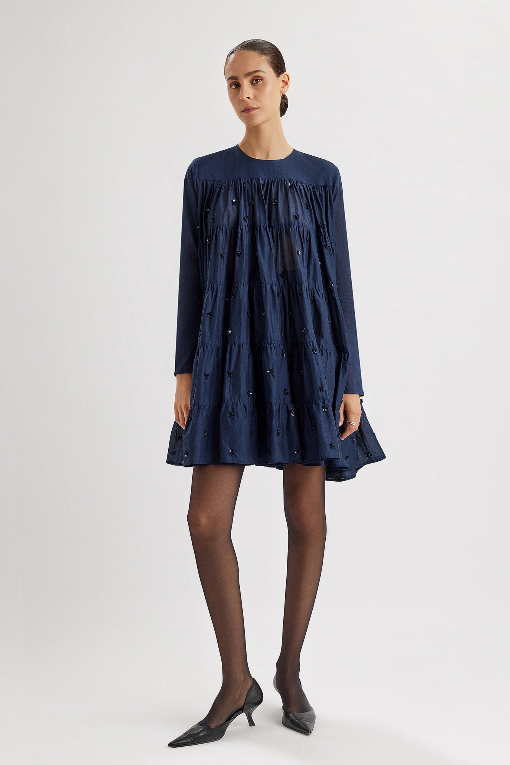 Merlette Soliman Embellished Dress in Navy - full-length front view of the tiered cotton voile mini