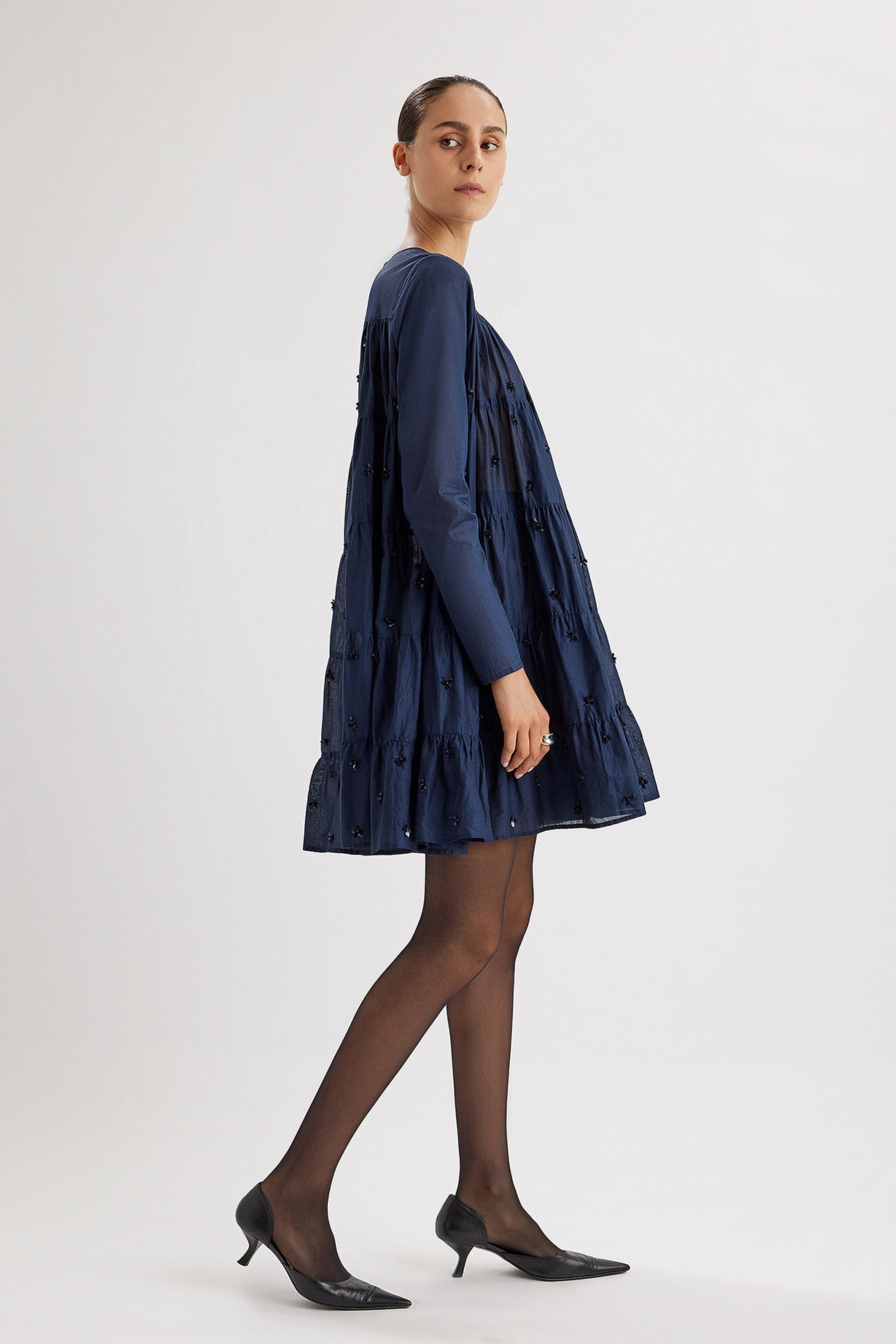 Merlette Soliman Embellished Dress in Navy - side view showing the volume through the tiers