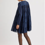 Merlette Soliman Embellished Dress in Navy - back view showing the smocked yoke and tiers