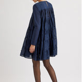 Merlette Soliman Embellished Dress in Navy - back view showing the smocked yoke and tiers