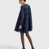 Merlette Soliman Embellished Dress in Navy - back view showing the smocked yoke and tiers