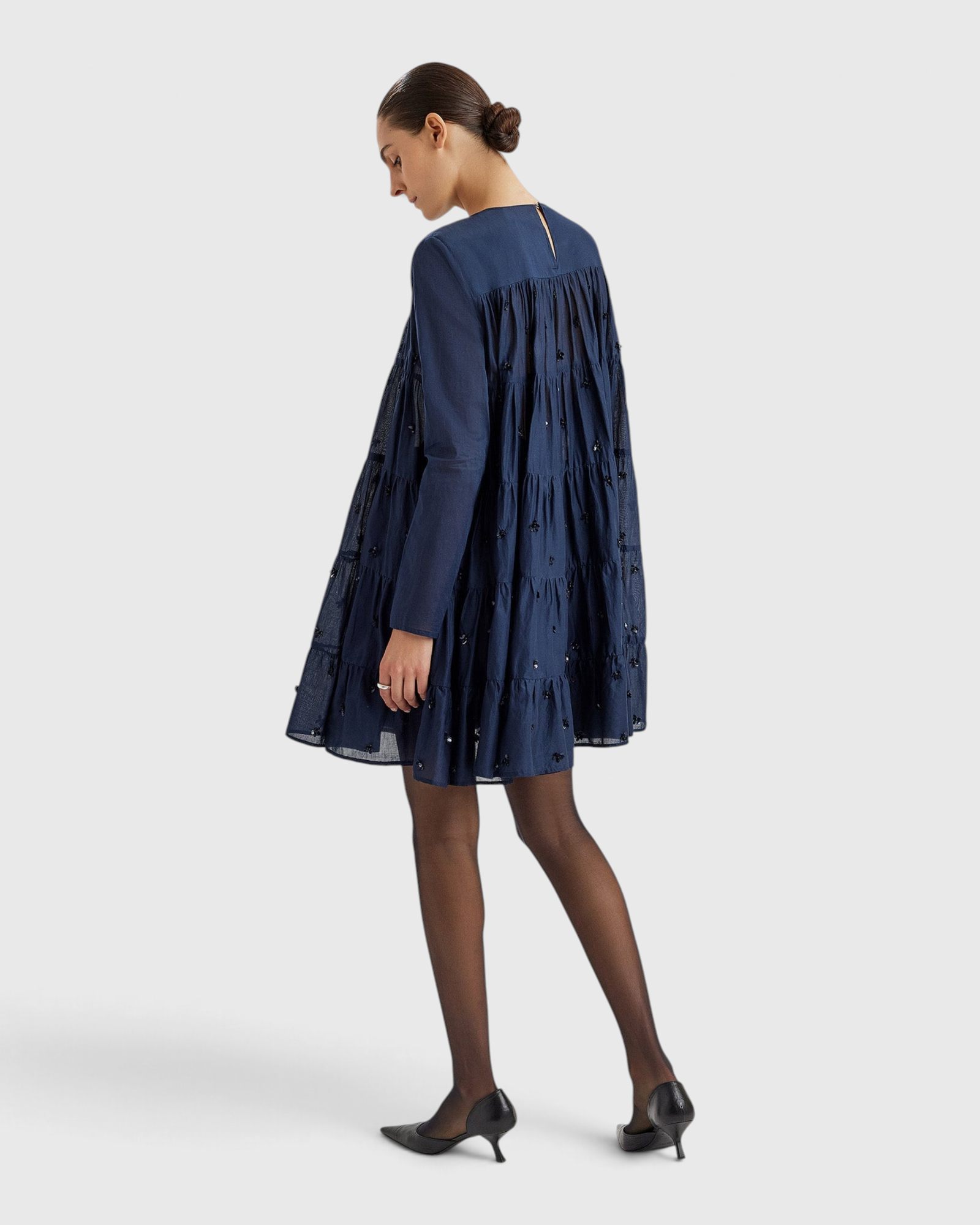 Merlette Soliman Embellished Dress in Navy - back view showing the smocked yoke and tiers