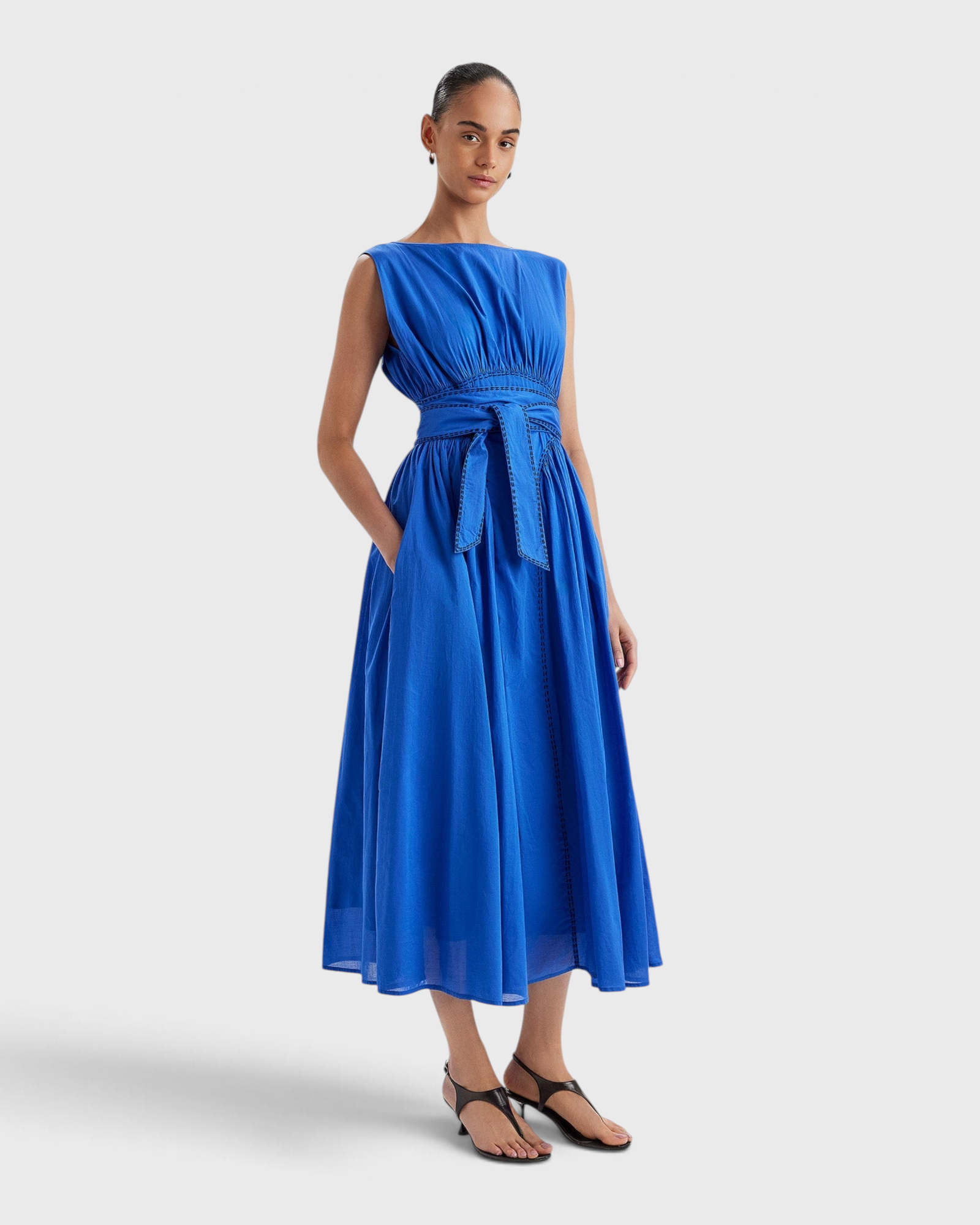 Merlette Verena Dress in Ultramarine — full-length front view worn with the waist ties knotted at the front