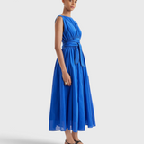 Merlette Verena Dress in Ultramarine - three-quarter view showing the skirt volume and drape