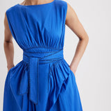 Merlette Verena Dress in Ultramarine — close detail of the waist panel, ties and side pocket