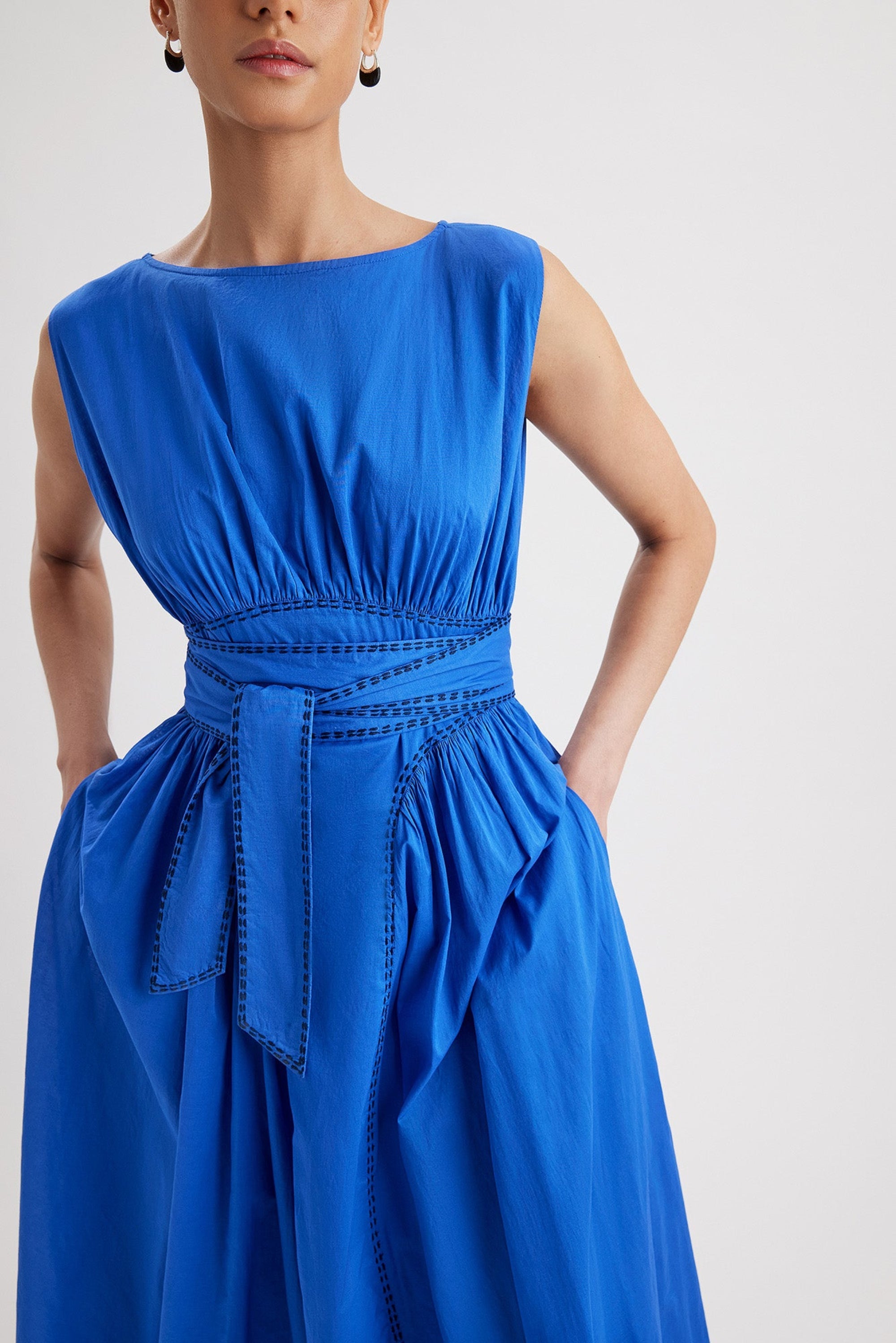 Merlette Verena Dress in Ultramarine — close detail of the waist panel, ties and side pocket