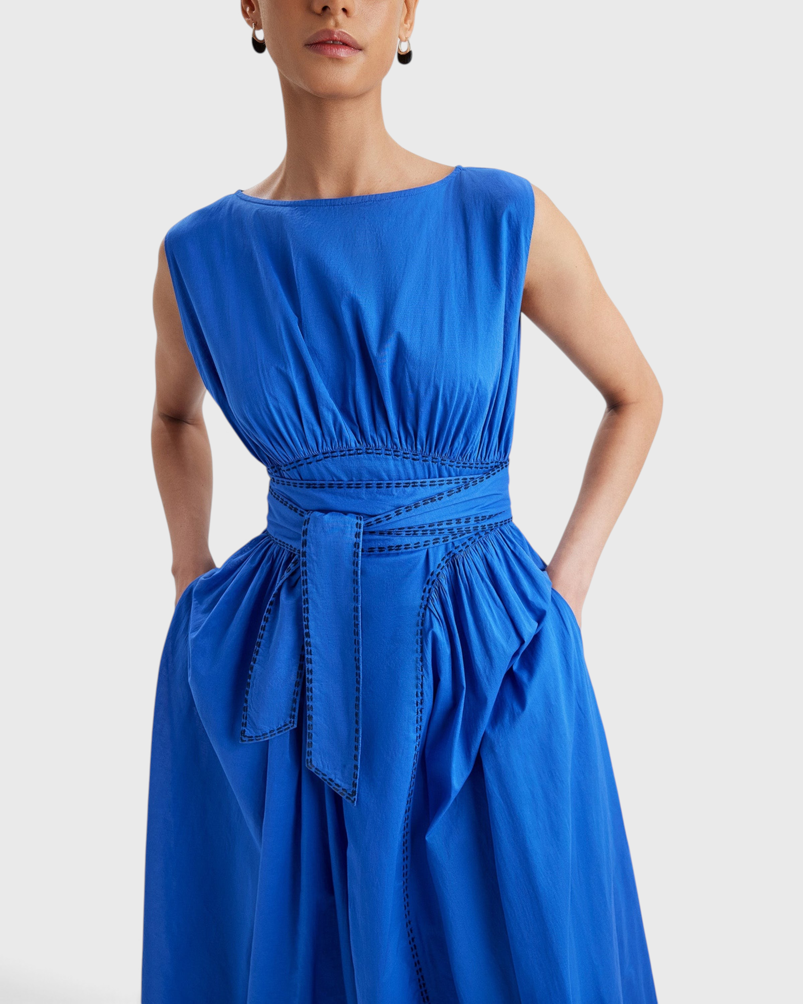 Merlette Verena Dress in Ultramarine — close detail of the waist panel, ties and side pocket