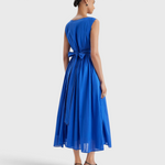 Merlette Verena Dress in Ultramarine — back view showing the waist ties and gathered skirt