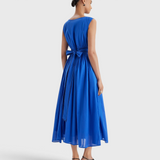 Merlette Verena Dress in Ultramarine — back view showing the waist ties and gathered skirt