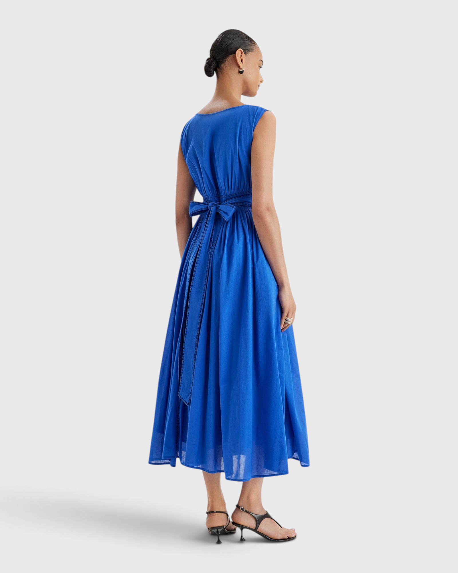 Merlette Verena Dress in Ultramarine — back view showing the waist ties and gathered skirt
