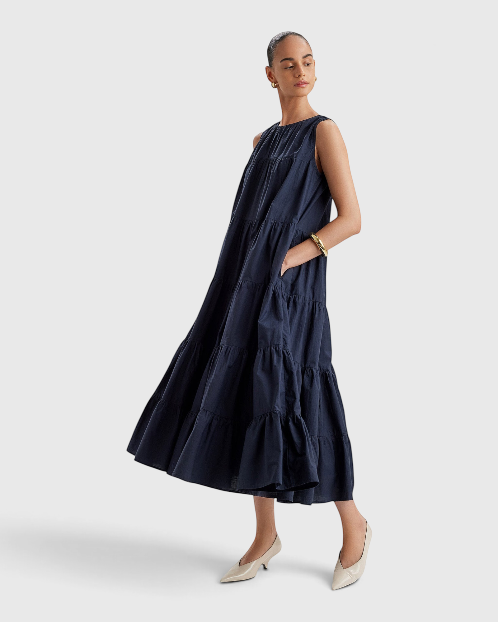 Merlette Caron Dress in Navy - side view showing the drape and side seam pocket