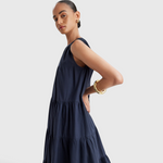 Merlette Caron Dress in Navy - detail view of the ruched tiers and cotton poplin fabric