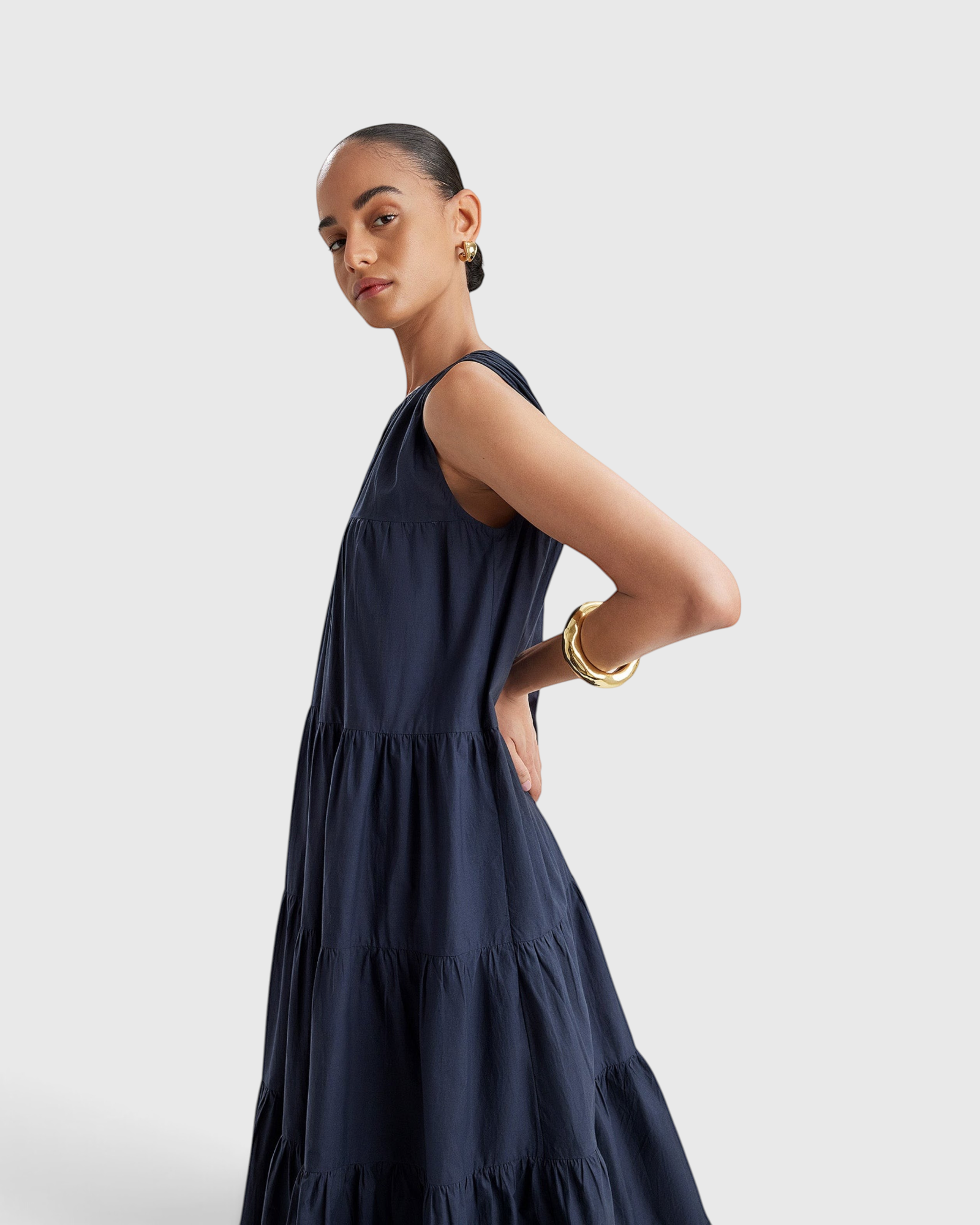 Merlette Caron Dress in Navy - detail view of the ruched tiers and cotton poplin fabric