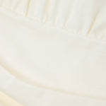 CLOSED Draped T-shirt - Ivory, fabric close-up of the compact organic cotton jersey.