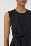 detail of front of dress: Waisted dress with deep back neckline and tie belt. Light falling quality with linen structure, slightly transparent look and beautiful folds.