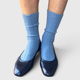 JONES + CO Le Bon Shoppe Classic Cashmere Socks in Bluebell blue, worn on a model.