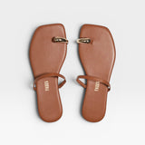JONES + CO Colette Sandal in Au Naturale brown leather with gold toe ring detail and thin ankle strap.