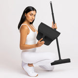 Woman posing with Broom + Dustpan Duo - Odyssey