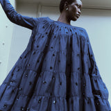 Merlette Soliman Embellished Dress in Navy - campaign image showing the sequin and bead floral embroidery in detail