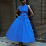 Merlette Verena Dress in Ultramarine — campaign image of the dress worn on location
