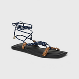 JONES + CO FLÒ SQUARE TWIN sandal featuring blue rope laces and hazelnut braided straps on a black square-toe sole.