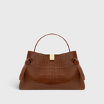 JONES + CO Gyoza pouch in brown embossed leather with a gold clasp and structured handle